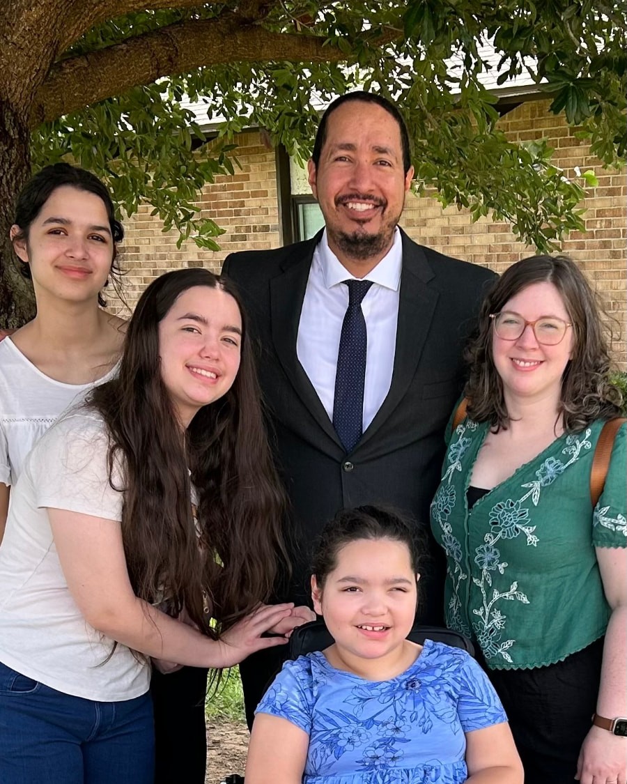 Sam Whitehawk, founder of WHITEHAWK ICF and host of The ICF Show, with his wife and daughters